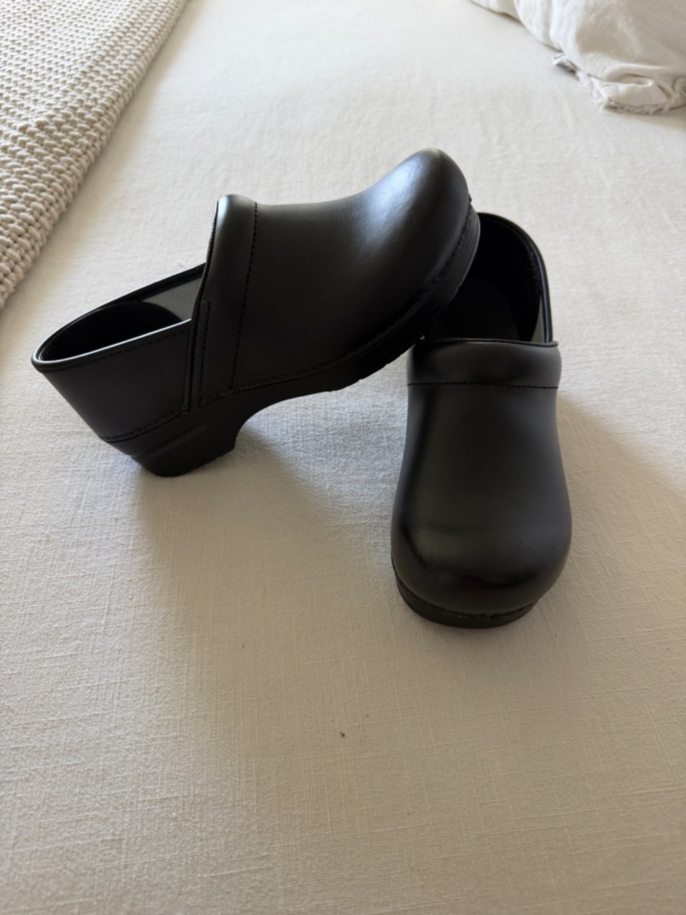 Dansko Black Leather Slip-On Clogs